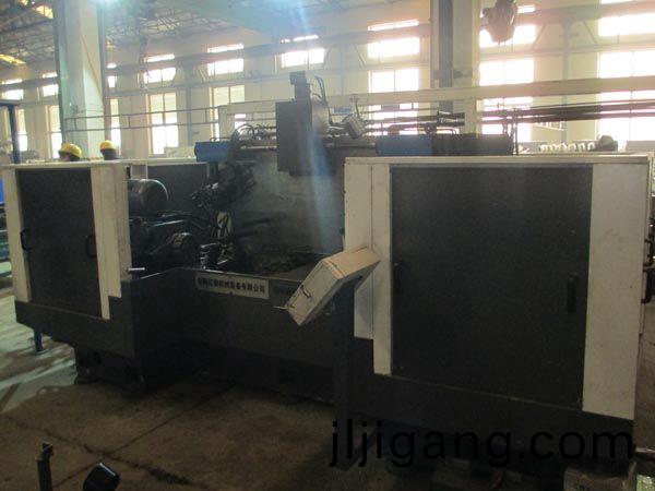 扭(niu)力樑(liang)雙(shuang)麵(mian)銑(xian)削(xue)組郃(he)機牀(chuang)